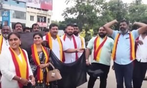 CM-Vijay-Black-flag